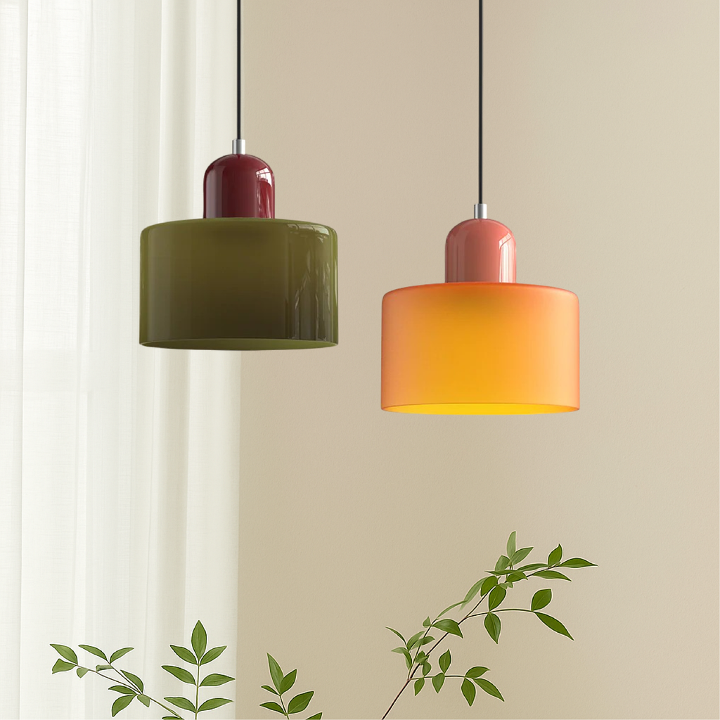 Olive and orange modern hanging pendant lights beside sheer curtains