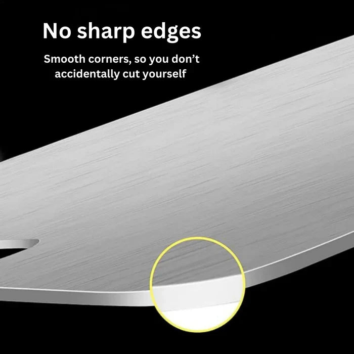 Stainless steel cutting board with cutout handle close-up