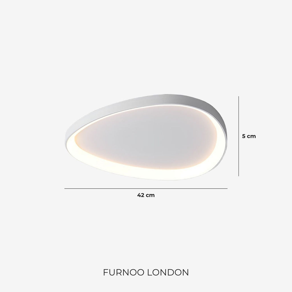 Sculptural ceiling light shown in a calm living space