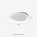 Sculptural ceiling light shown in a calm living space