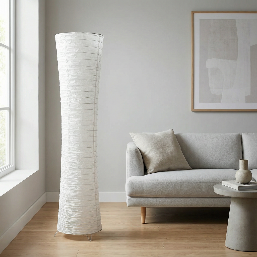 Paper floor lamp beside sofa