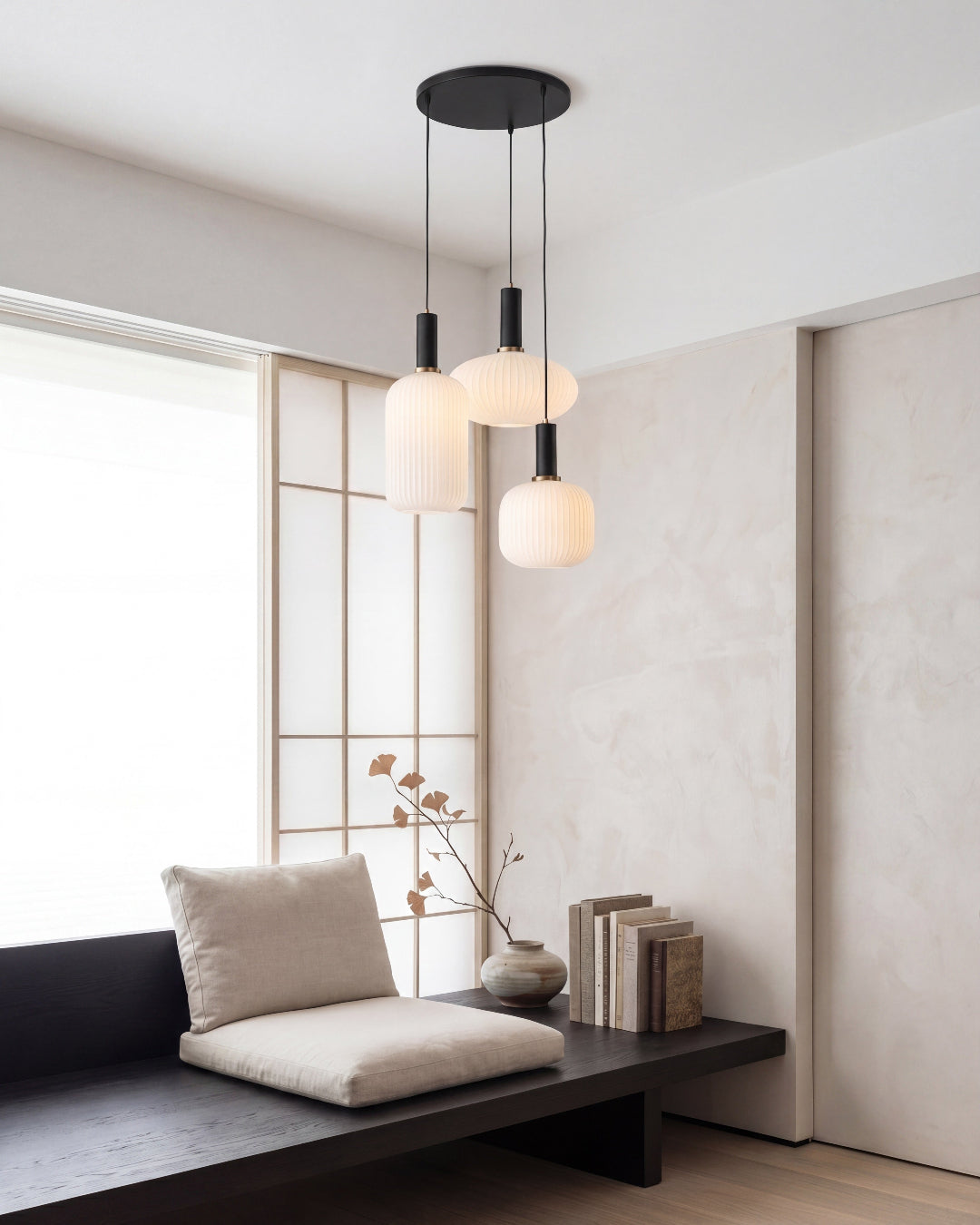 Group of modern hanging pendant lights in mixed glass colors