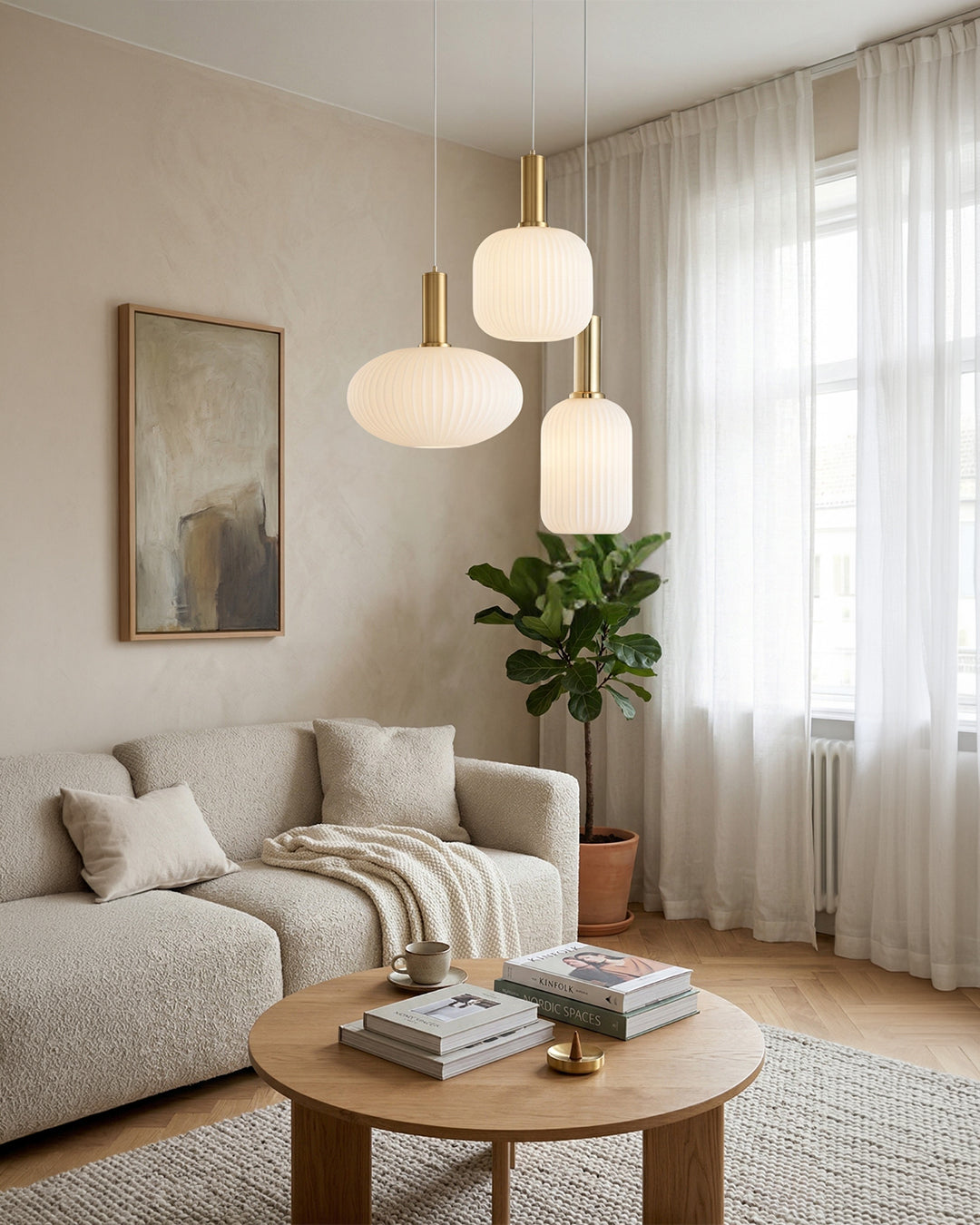 White ribbed glass pendant lights grouped in a calm living room