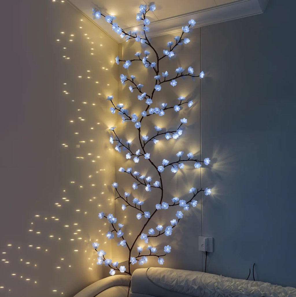 Iced Blossom LED wall lights glowing in a living room corner