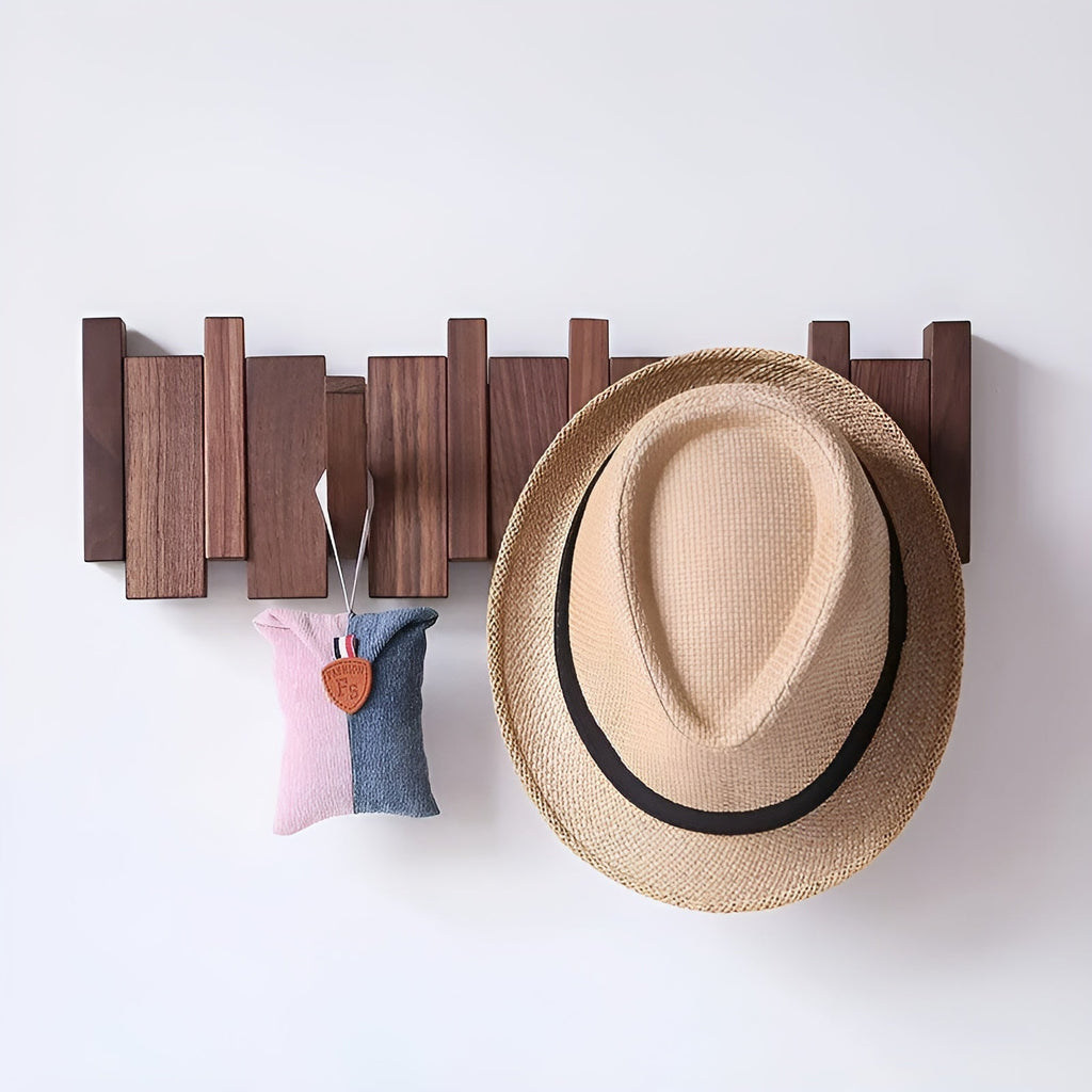 Wooden wall hooks with folding pegs