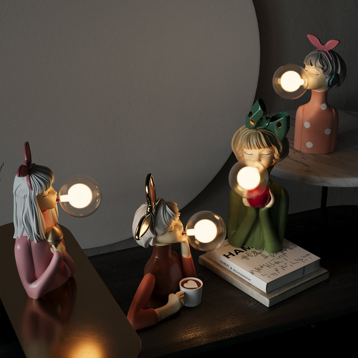Sculptural lamp on a stack of books with glowing glass bubble