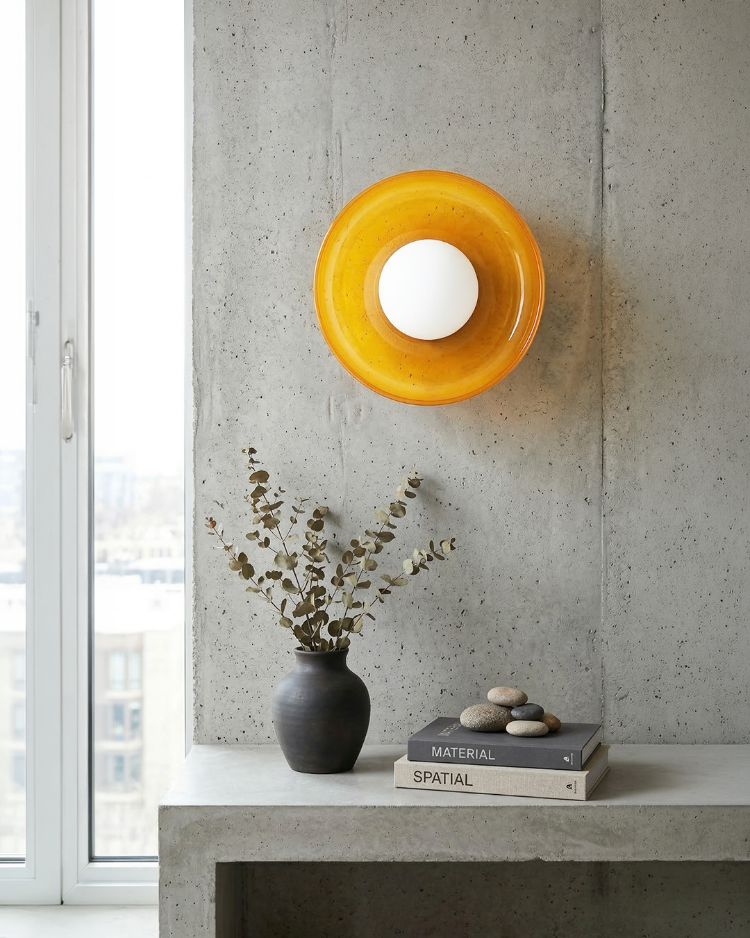 Orange glass wall light with warm white globe