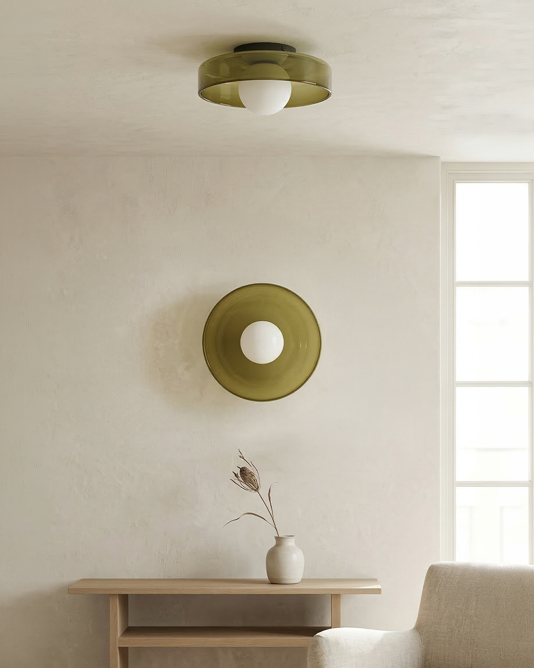 Tawny olive glass wall and ceiling light above wooden console