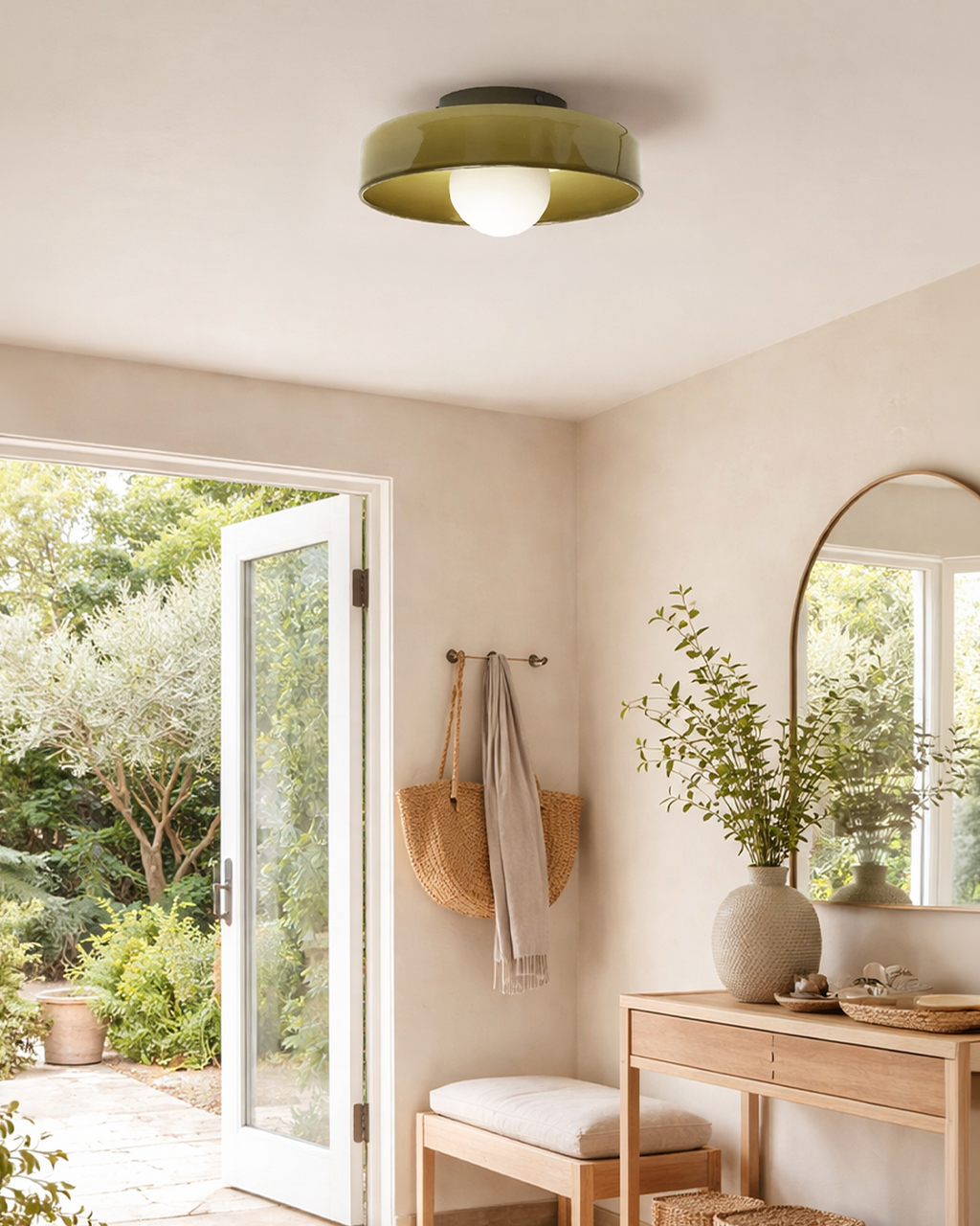 Tawny olive glass light mounted on a neutral wall
