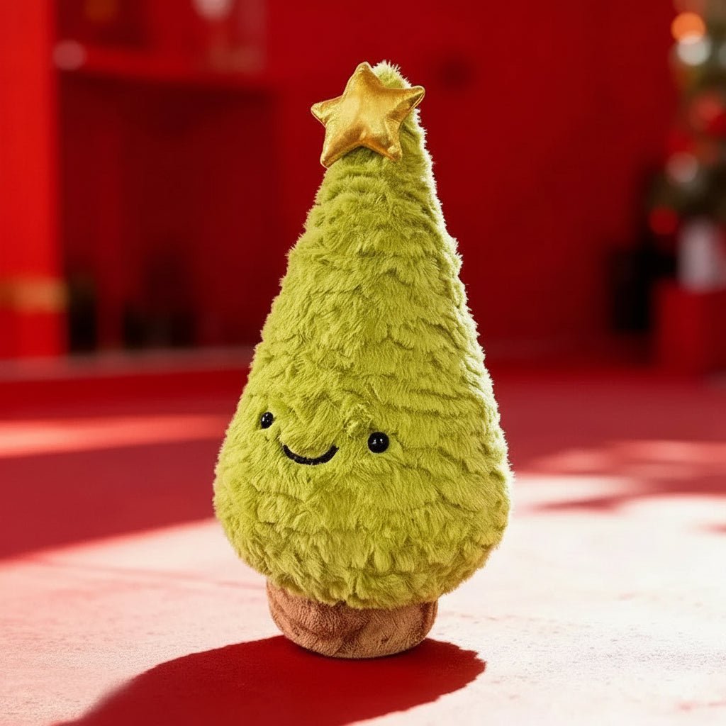 Light green plush tree with gold star in warm sunlight