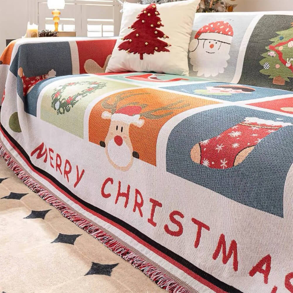 Close-up of Merry Christmas lettering on knit sofa cover