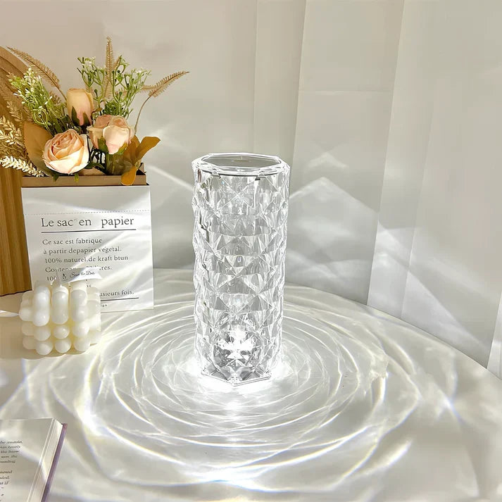 Faceted lamp glowing softly on a side table