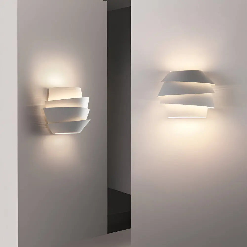 Close view of layered shade on modern bedroom wall light