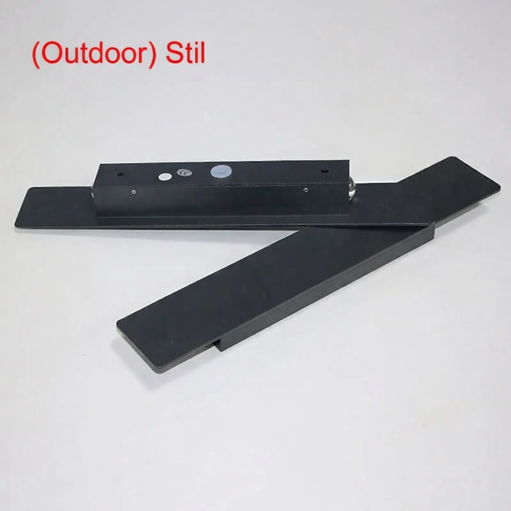 Black wall light fixture with mounting base, shown disassembled