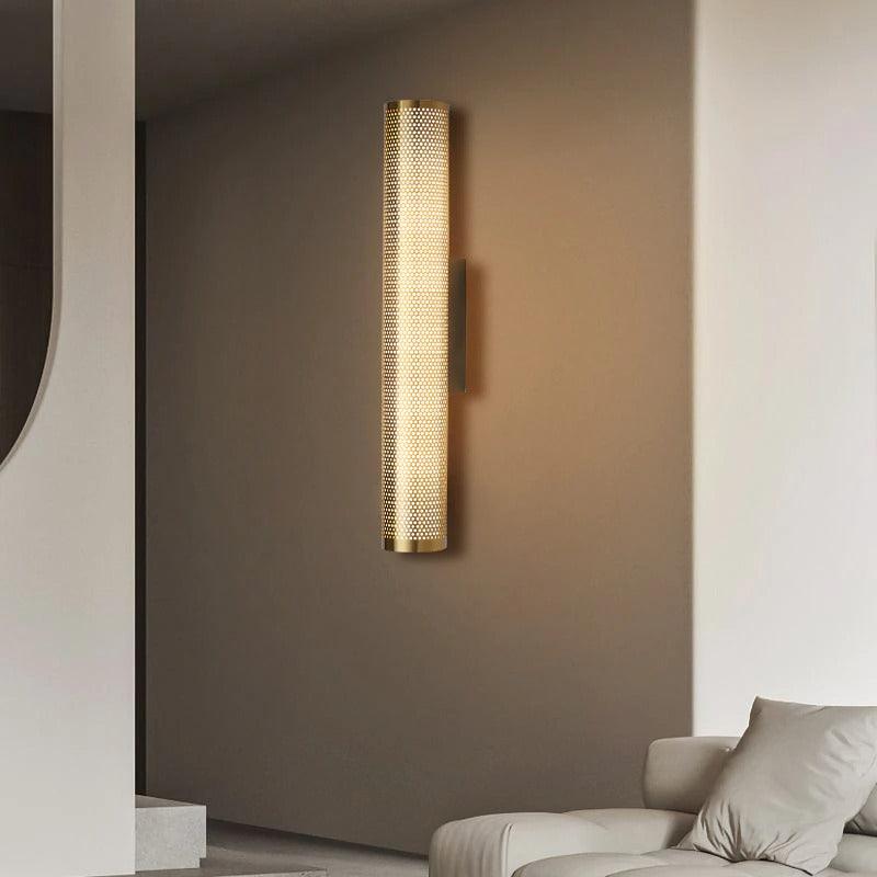 Brass wall sconce in hallway
