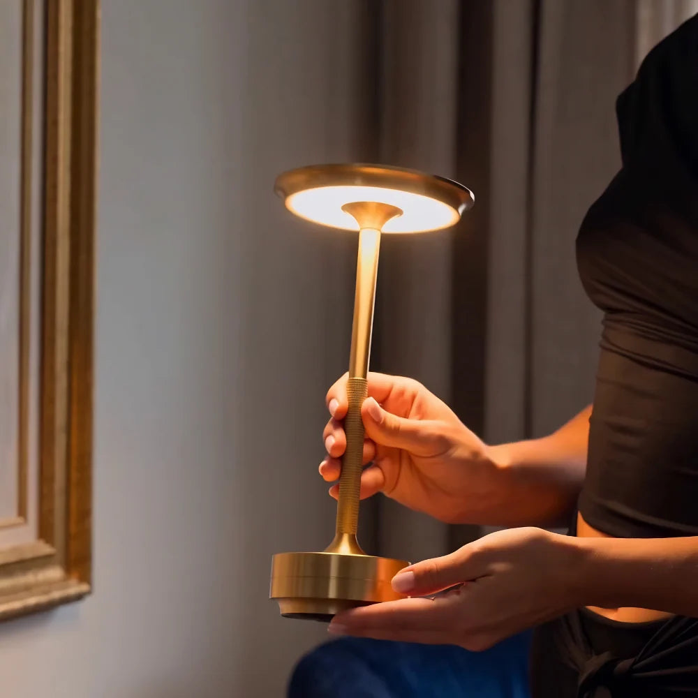 Gold dining table lamps setting a warm dinner mood