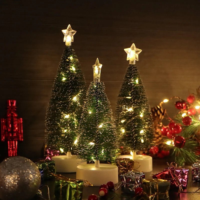 Warm white Christmas tree lights on three mini faux trees