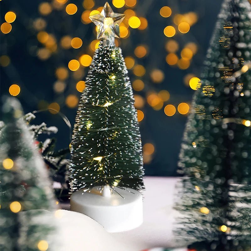 Mini faux Christmas tree with star topper and frosted bristles