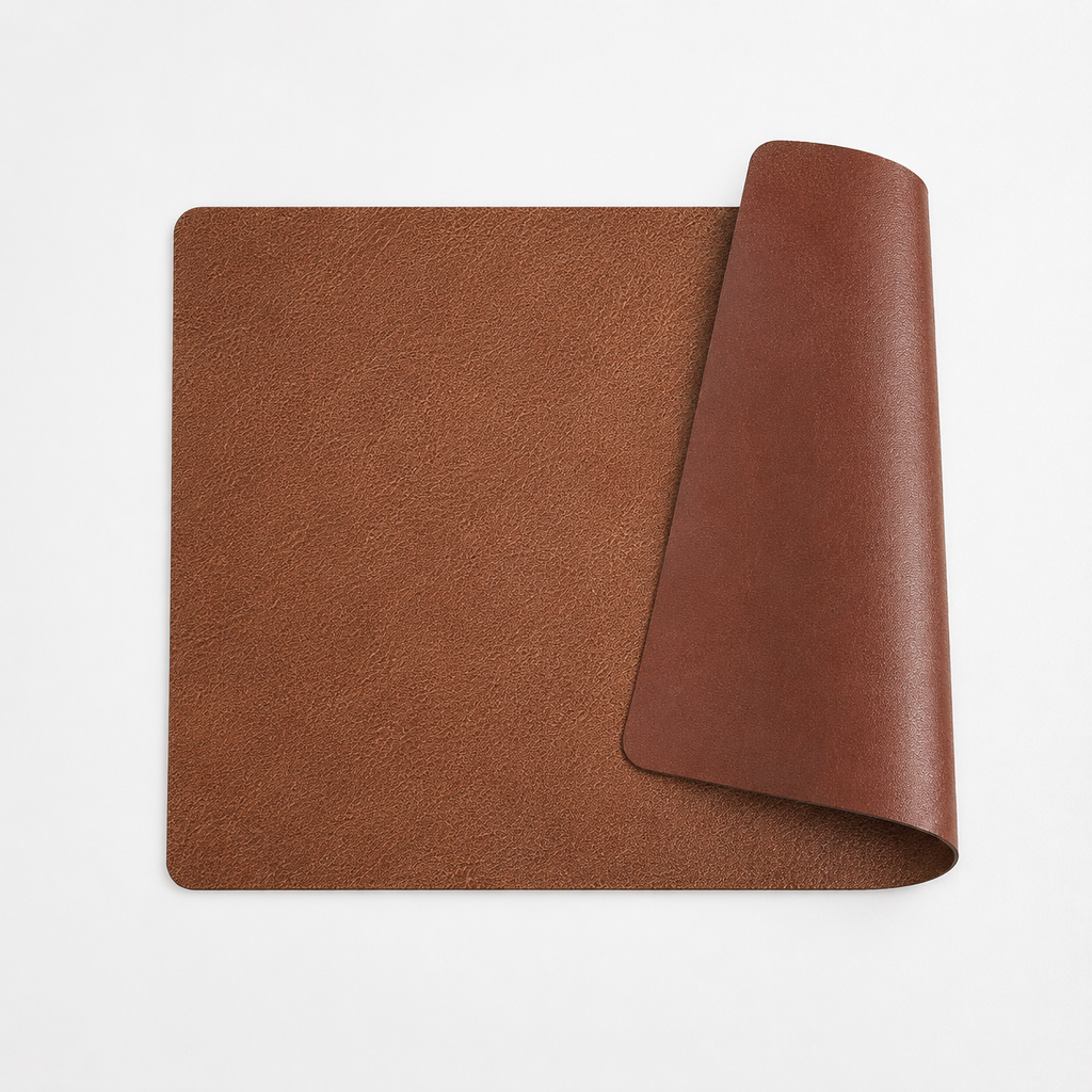 Faux leather placemats stacked, showing both finished sides