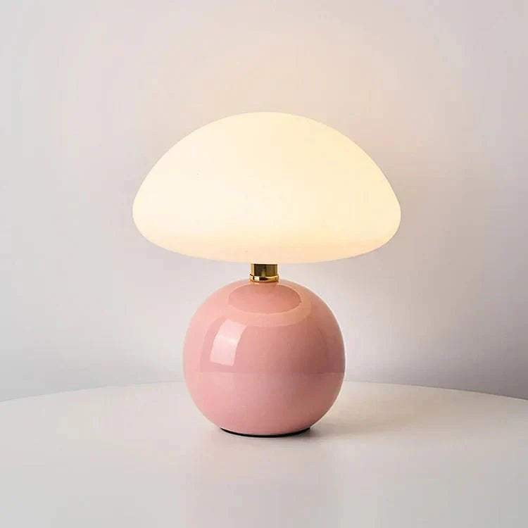 Ceramic lamp bringing warm light to a reading corner
