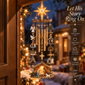 Christmas wind chime with star topper hanging at a front door